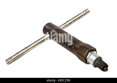 Old wrench key and spark plug, isolated on white, with clipping path Stock Photo