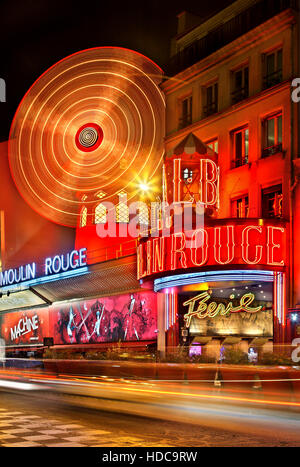 Moulin Rouge ('red mill') one of the world's most famous cabarets, at Pigalle district, close to Montmartre, Paris, France