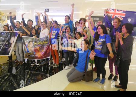 Pasay, Philippines. 10th Dec, 2016. Fans cheers just outside the party area. Miss Universe officially started in the Philippines with its Kick-off Party at S Maison Mall, Conrad Hotel, SM Mall of Asia, Pasay City at 7:00pm. Presented with Pia Wurtzbach, reigning Miss Universe, candidates from Australia, Japan, Indonesia, Korea, Malaysia, Myanmar, New Zealand, Philippines, Thailand, Vietnam and USA. Credit:  George Buid/Pacific Press/Alamy Live News Stock Photo