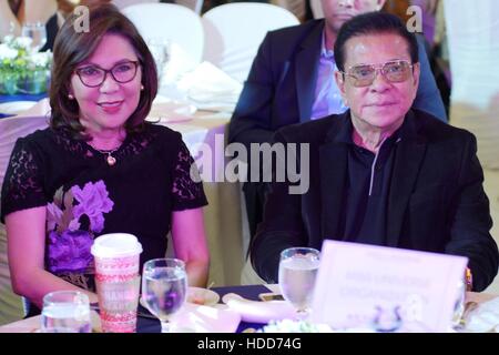 Pasay, Philippines. 10th Dec, 2016. Wanda Corazon Teo (on the left) seated with one of the sponsors former Governor of Ilocus Sur Chavit Singson. Miss Universe officially started in the Philippines with its Kick-off Party at S Maison Mall, Conrad Hotel, SM Mall of Asia, Pasay City at 7:00pm. Presented with Pia Wurtzbach, reigning Miss Universe, candidates from Australia, Japan, Indonesia, Korea, Malaysia, Myanmar, New Zealand, Philippines, Thailand, Vietnam and USA. Credit:  George Buid/Pacific Press/Alamy Live News Stock Photo