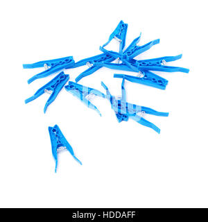Pile of blue plastic cloth pegs isolated over white background Stock Photo