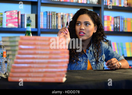 Ayesha Curry signing copies of her first cookbook 'The Seasoned Life: Food, Family, Faith, and the Joy of Eating Well' at Books & Books, Bal Harbour Shops in Miami Beach, Florida.  Featuring: Ayesha Curry Where: Miami Beach, Florida, United States When: 0 Stock Photo