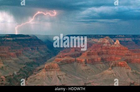 Lightning strikes in the South Rim of the Grand Canyon during a summer storm as seen from Mather Point at the Grand Canyon National Park April 17, 2012 in Grand Canyon Village, Arizona. Stock Photo