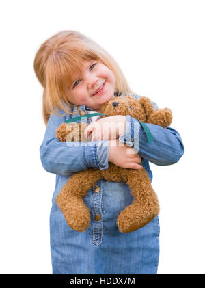 Cute Little Girl Holding Her Teddy Bear Isolated on a White Background. Stock Photo