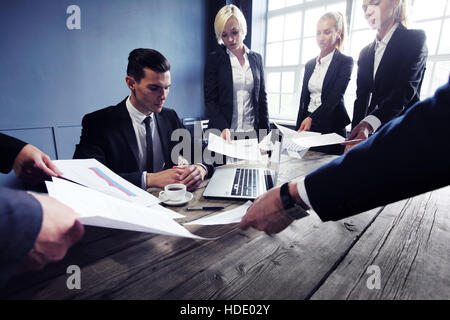 Business man getting extra work from collegues deadline concept Stock Photo