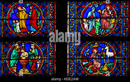 Stained Glass in Notre Dame Cathedral of Paris depicting scenes in the Life of Saint Joseph, husband of Mary, Mother of Jesus Stock Photo