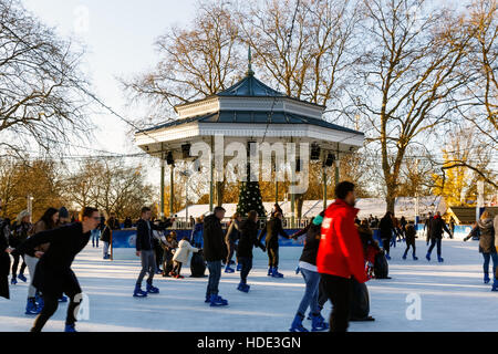 London, UK - November 25, 2016 - People ice skating at Winter Wonderland, a Christmas fair in Hyde Park Stock Photo