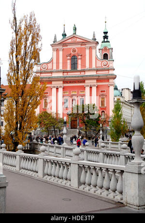 Franciscan Church of the Annunciation viewed over tromostovje bridge. Ljubljana, Slovenia Stock Photo