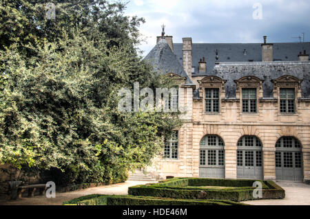 Inside the garden of the world famous Hotel Sully in Le Marain in Paris, France Stock Photo