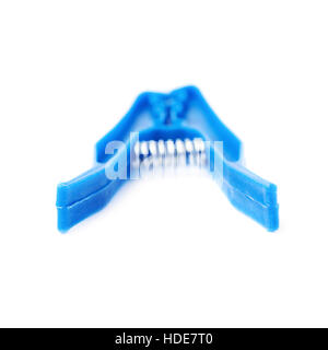 Single plastic cloth peg isolated over white background Stock Photo