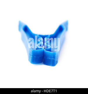 Single plastic cloth peg isolated over white background Stock Photo