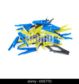 Pile of cloth pegs isolated over white background Stock Photo