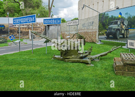 Dnepropetrovsk, Ukraine - May 19, 2016: Open air museum dedicated to war in the Donbass. Anti-aircraft machine gun and ammunition Stock Photo