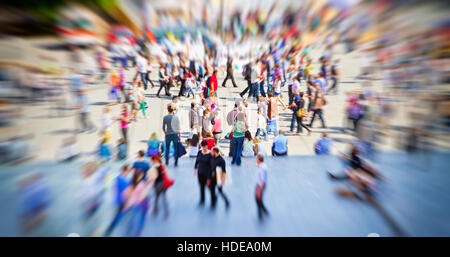 Crowds of people walking in a city Stock Photo