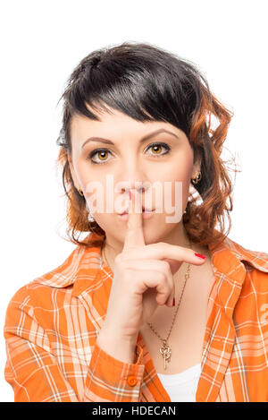 girl shows gesture that you need be quieter on a white background Stock Photo