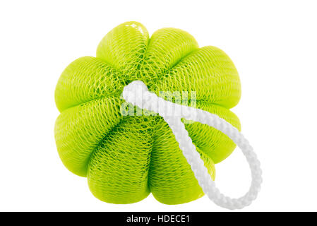 Green sponge close up on a white background isolated Stock Photo