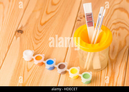 watercolor paints to draw and set of brushes in a glass Stock Photo