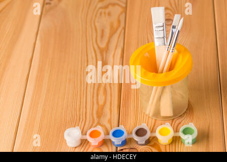 paints and brushes for painting children's lesson close-up Stock Photo