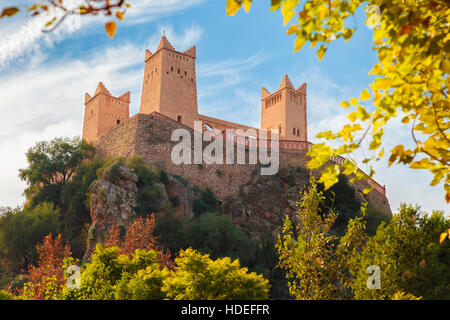 View from the garden of Ain Asserdoun to the Kasbah Ras el-Ain in Morocco on a sunny day. Stock Photo