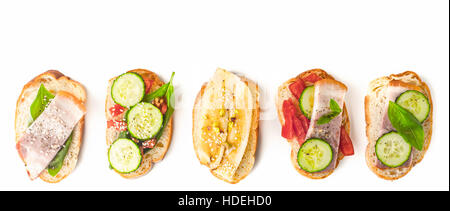 Different tartines on the white background wide screen Stock Photo