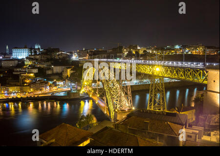 Ribeira and Ponte Luís 1, by Théophile Seyrig and Gustave Eiffel, 1886, River Douro, Porto, Portugal, at night Stock Photo