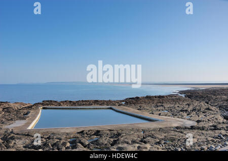 The tidal rock swimming pool at Westward Ho! on the North Devon coast. Stock Photo