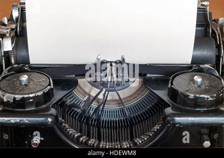 Old typewriter and blank sheet of paper for your text Old typewriter and blank sheet of paper for your text