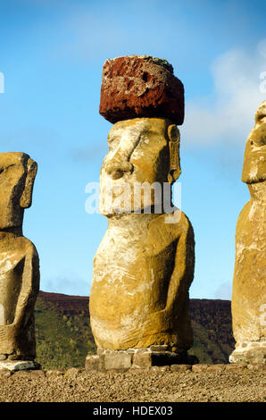 Moai closeup on Easter Island, Chile.  The red stone on its head is called a pukao Stock Photo