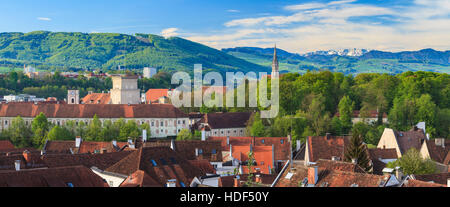 View at the old town of Steyr in Upper Austria, in the background the alpine foreland and the mountains of Sengsengebirge. Stock Photo