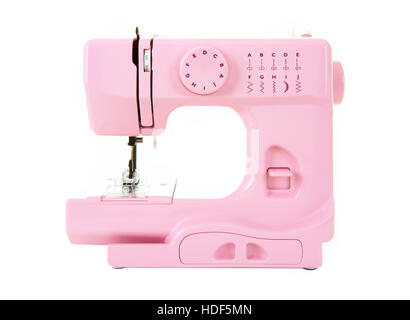 Pink Electric Sewing Machine on a white background Stock Photo