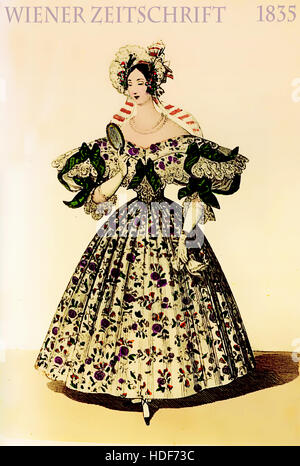 Vienna 1835 fashion, young lady elegant dressed with fancy floral cloth looking in the mirror Stock Photo