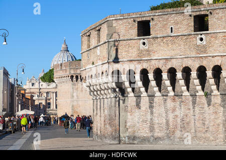 ROME, ITALY - OCTOBER 31, 2016: tourists near walls of Castel Sant Angelo (Castle of the Holy Angel, Mausoleum of Hadrian) in Rome city. This tomb of Stock Photo