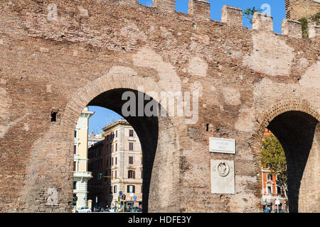 travel to Italy - gate (Porta San Giovanni) in ancient city Aurelian Wall in Rome Stock Photo