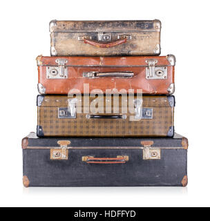 A stack of old suitcases isolated on white background Stock Photo