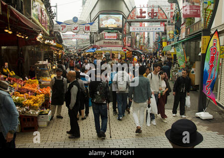 Japanese people and travelers foreigner walking and shopping on street in Ameyayokocho market at Ueno district on October 21, 2016 in Tokyo, Japan Stock Photo