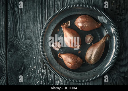 Premium Photo  Onion shallot on a black, dark background eating vegetables  and eating healthy eating shallots adding to various dishes, diversifying  food