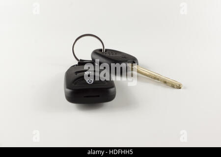 key with remote control of car alarm on a white background Stock Photo