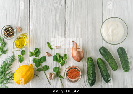 Ingredients for tzatziki on the white wooden table horizontal Stock Photo