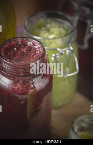 Jar with different smoothies vertical Stock Photo