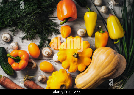 Yellow and green vegetables on the white wooden table horizontal Stock Photo
