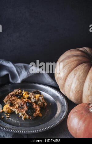Pumpkin dump cake on the metal plate  vertical Stock Photo