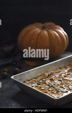 Pumpkin pie on the  wooden table vertical Stock Photo