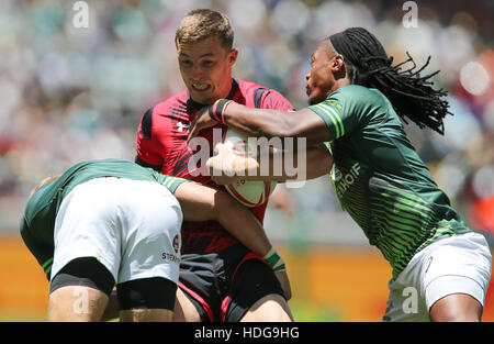 The SA Rugby Springbok Sevens players in action during the 2016 HSBC Sevens tournament at the Cape Town Stadium in Green Point Point, Cape Town. Stock Photo