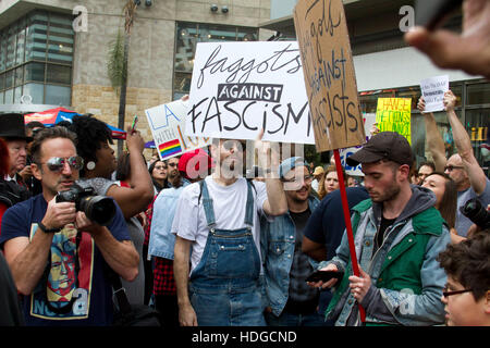 Los Angeles, USA. 10th Dec, 2016. Anti-Trump protesters hold banners and shout slogans as they take part in a demonstration at Hollywood blvd. © Katrina Kochneva/ZUMA Wire/Alamy Live News Stock Photo