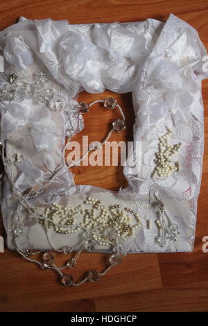 beautiful white lace frame from fabric and beads for save photo nice holiday gift Stock Photo