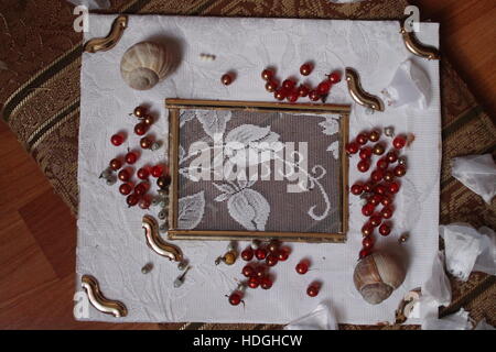 beautiful lace frame for care photo from fabric and beads nice gift on holiday Stock Photo