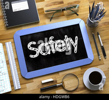 Safety - Text on Small Chalkboard. 3D. Stock Photo