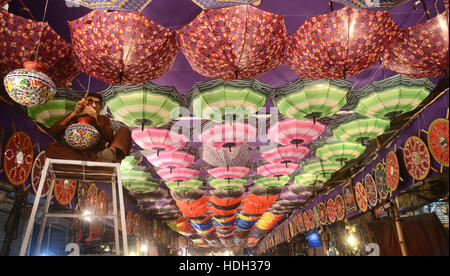 Lahore, Pakistan. 11th Dec, 2016. Pakistani devotee people decorating a market with colorful stuff on the celebration of Eid Milad-un-Nabi, the birthday of the Prophet Muhammad. The birth of the Prophet Mohammed is celebrated on on 12 Rabil ul Awal in the Muslim calendar. The birth of the Prophet Mohammed is celebrated on 12 Rabil ul Awal in the Muslim calendar Credit:  Rana Sajid Hussain/Pacific Press/Alamy Live News Stock Photo