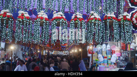 Lahore, Pakistan. 11th Dec, 2016. Pakistani devotee people decorating a market with colorful stuff on the celebration of Eid Milad-un-Nabi, the birthday of the Prophet Muhammad. The birth of the Prophet Mohammed is celebrated on on 12 Rabil ul Awal in the Muslim calendar. The birth of the Prophet Mohammed is celebrated on 12 Rabil ul Awal in the Muslim calendar Credit:  Rana Sajid Hussain/Pacific Press/Alamy Live News Stock Photo