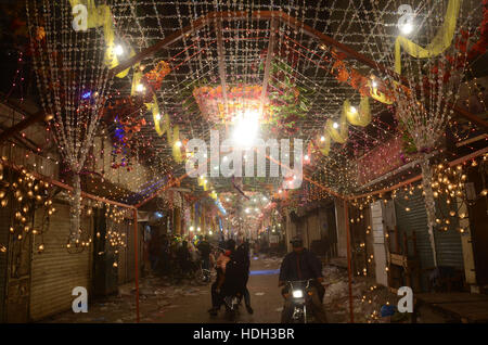 Lahore, Pakistan. 11th Dec, 2016. Pakistani devotee people decorating a market with colorful stuff on the celebration of Eid Milad-un-Nabi, the birthday of the Prophet Muhammad. The birth of the Prophet Mohammed is celebrated on on 12 Rabil ul Awal in the Muslim calendar. The birth of the Prophet Mohammed is celebrated on 12 Rabil ul Awal in the Muslim calendar Credit:  Rana Sajid Hussain/Pacific Press/Alamy Live News Stock Photo
